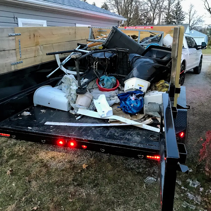 Roll-off dumpster delivered to a residential driveway in Madison