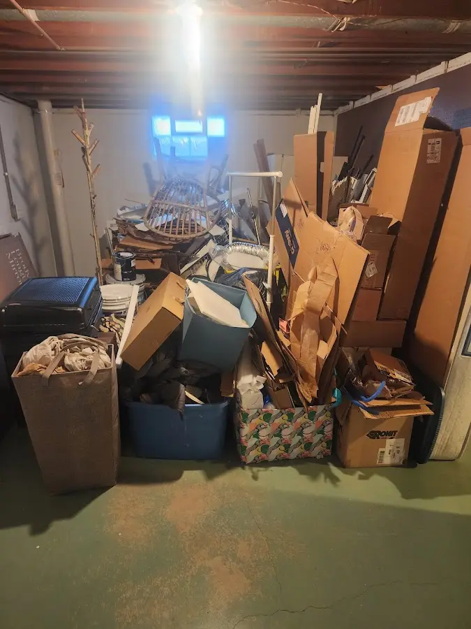 Roll-off dumpster container at job site for 15 Yard Dumpster Rental in Madison